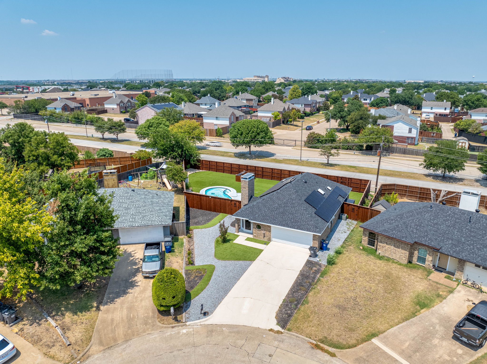 Drone shot of a house with a pool in North Texas
